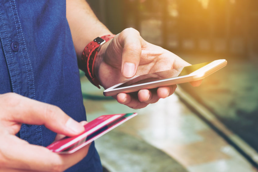 67859116 - man use smart phone and holding credit card with shopping online. online payment concept.